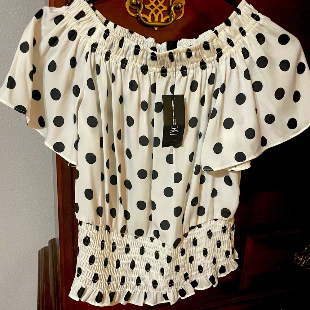 White and black silk polka dotted blouse.  Can be worn off the shoulders.
